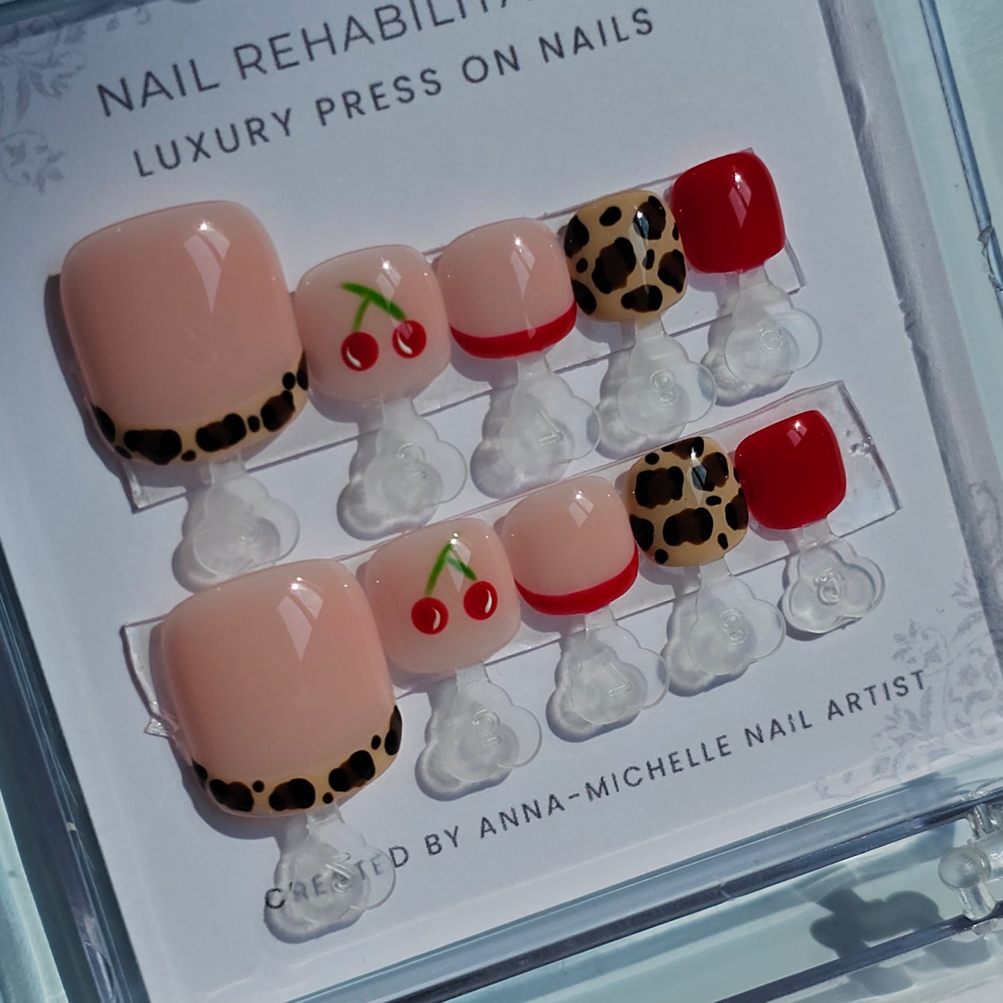 Leopard print 🐆 and cherry's 🍒 press ons with matching toe nails