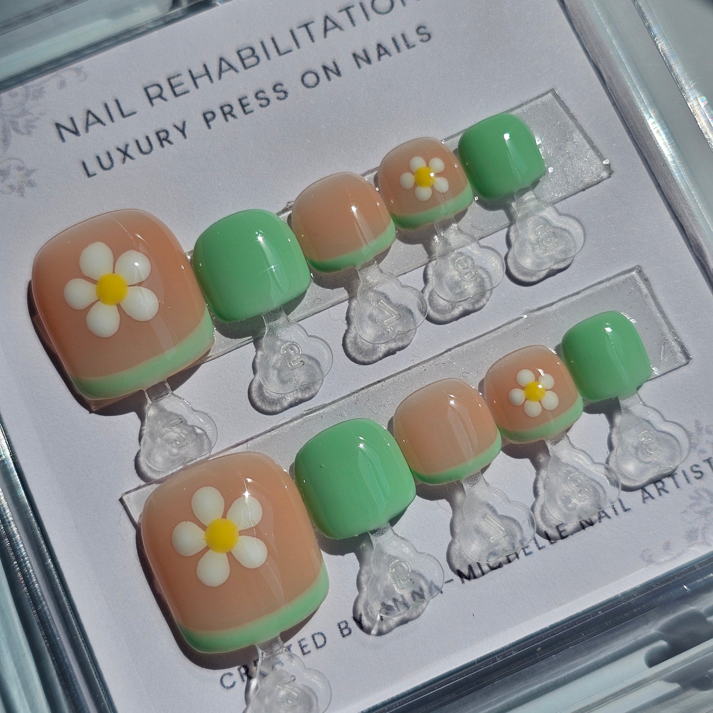 Green with floral press ons with matching toe nails