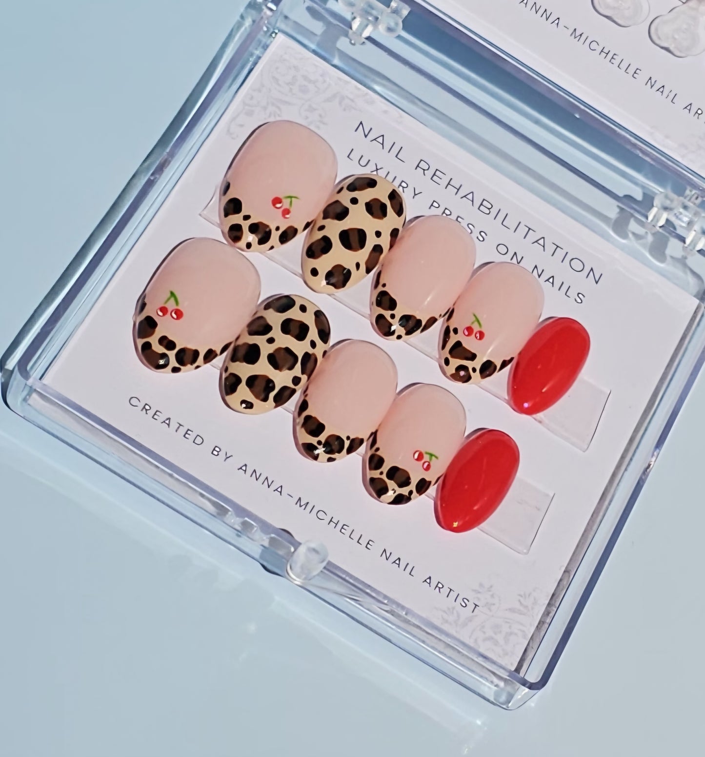 Leopard print 🐆 and cherry's 🍒 press ons with matching toe nails